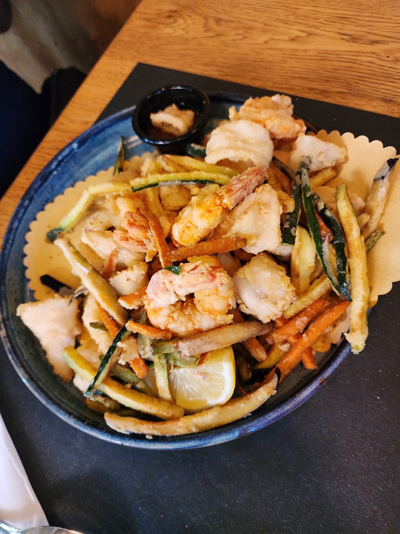 Golden fried shrimp, calamari, zucchini, and carrot sticks served with lemon